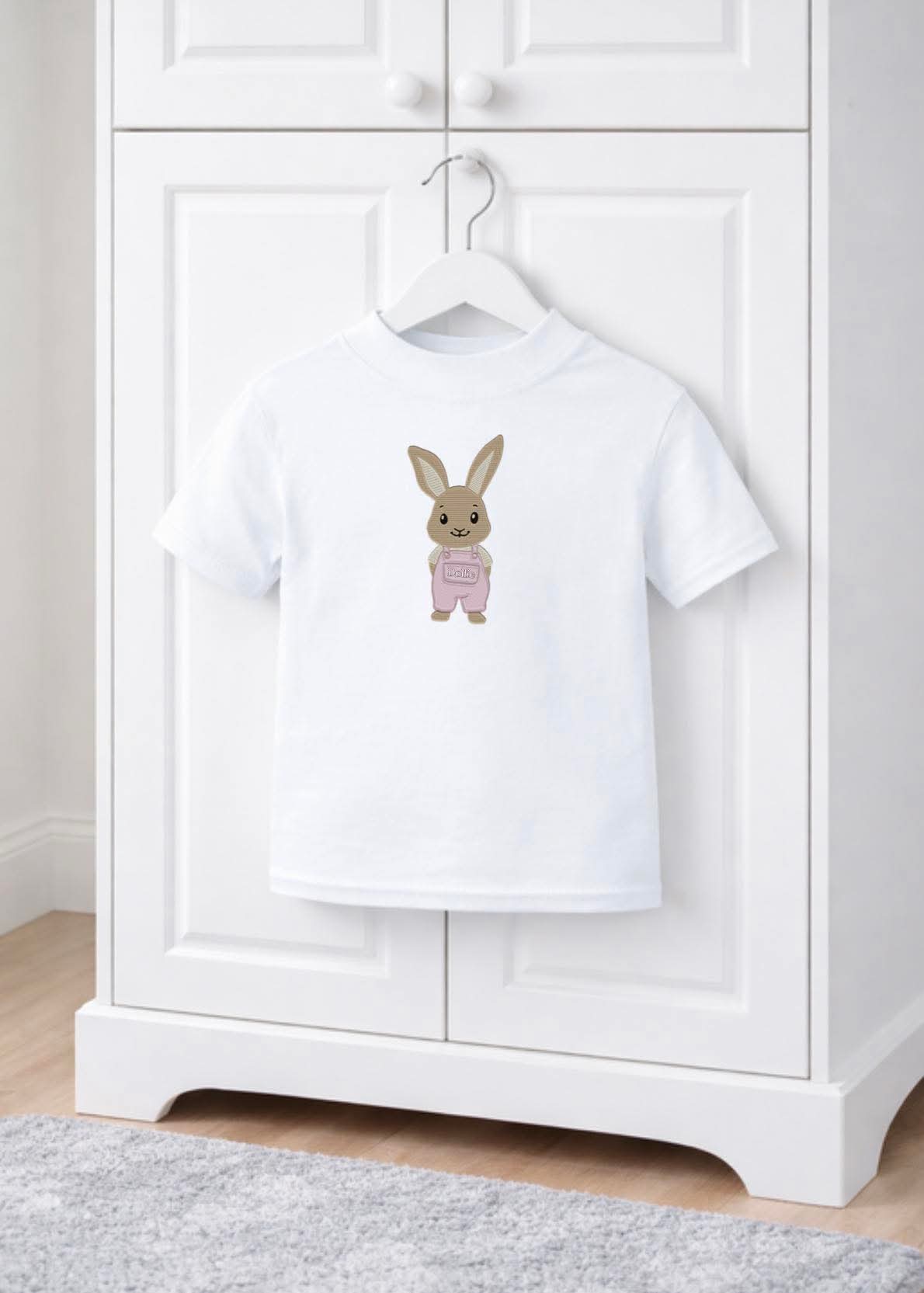 Embroidery style pink dungaree bunny